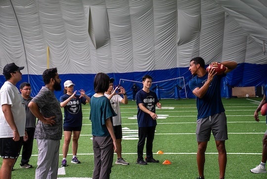 Rice Grad Students at the International Football Clinic